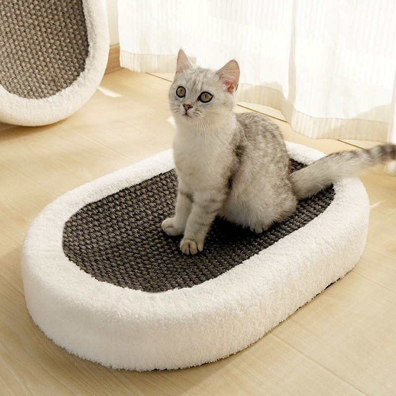 Oval cat bed scratch basin with white plush sides and dark gray woven center