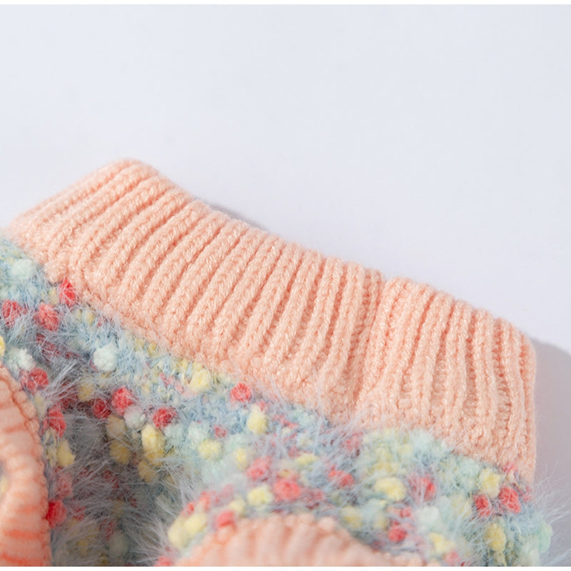 Multicolor knit pet sweater close-up with ribbed peach hem and cuff