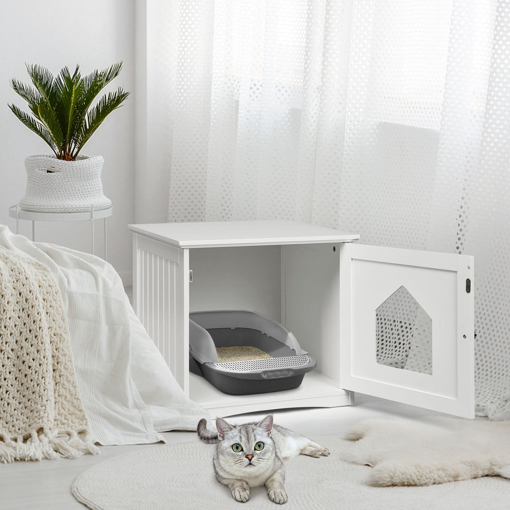White cat house side table with open front door and grey litter tray inside