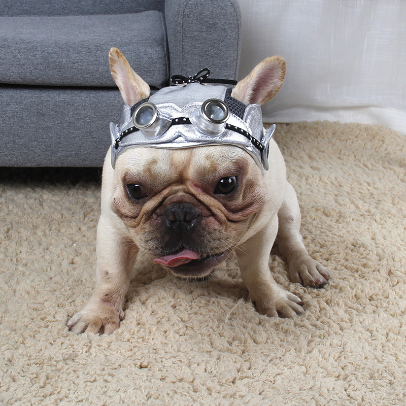 Dog party costume headpiece in silver and black with circular goggles and studded straps