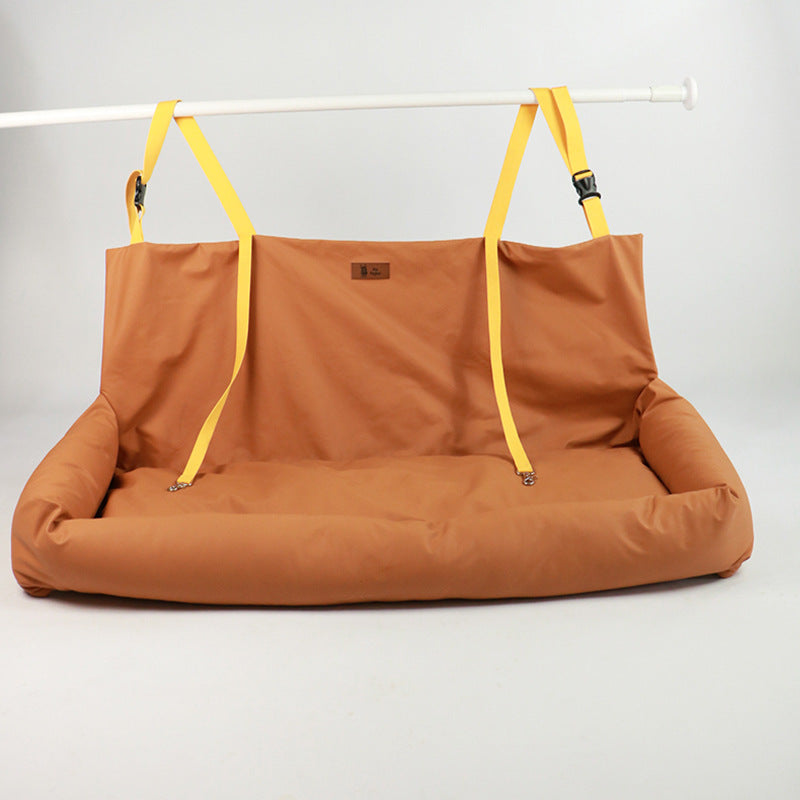 Orange dual-seat pet car mat with side handles and padded bolster sides