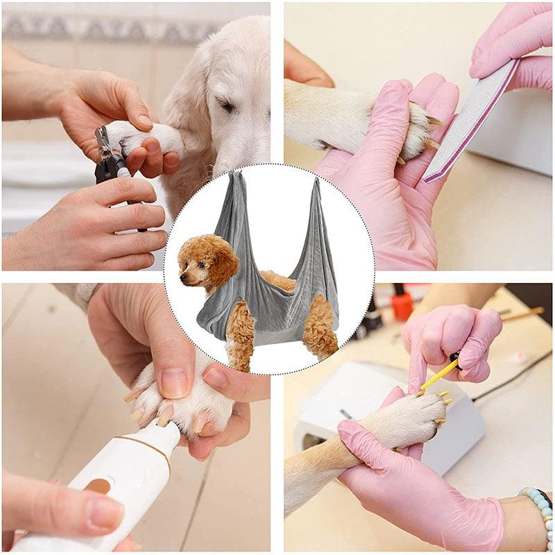 Gray grooming hammock harness for trimming with two leg holes and center neck opening