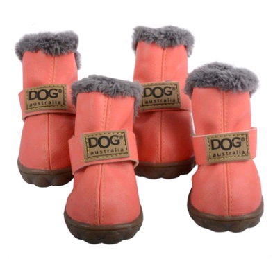 Coral dog snow boots with gray faux-fur cuffs and DOG Australia strap patches.