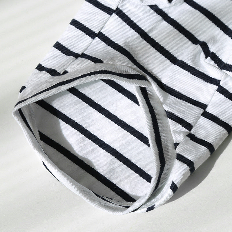 Striped pet hoodie fabric close-up: white knit with bold black horizontal stripes