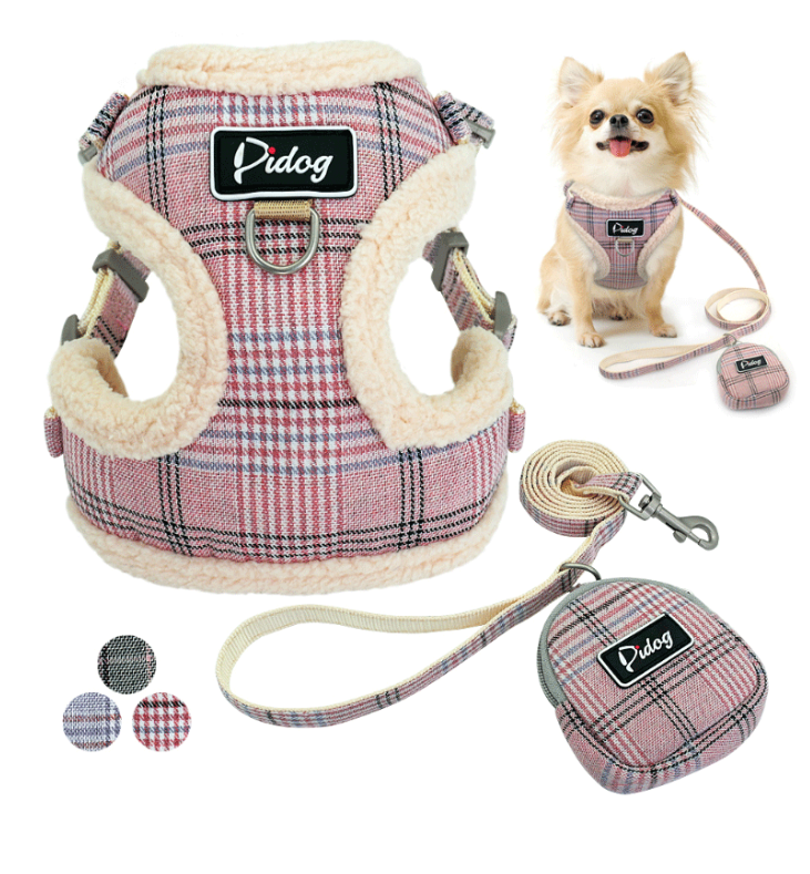 Plaid plush dog harness with matching leash and small pouch accessory, pink/blue tones.