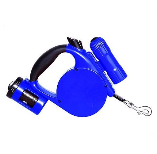 Blue retractable dog leash with LED flashlight attachment and waste bag dispenser
