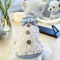 Cream knit pet sweater with blue ruffled collar and three round front buttons
