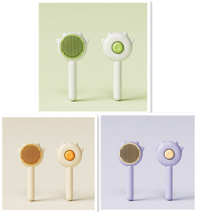 Pet grooming comb brushes with green, orange, and purple pin pads, white cat-shaped handles
