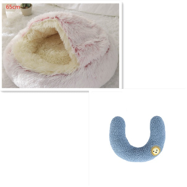 Blue plush U-shaped pet bed with small chick patch on the front