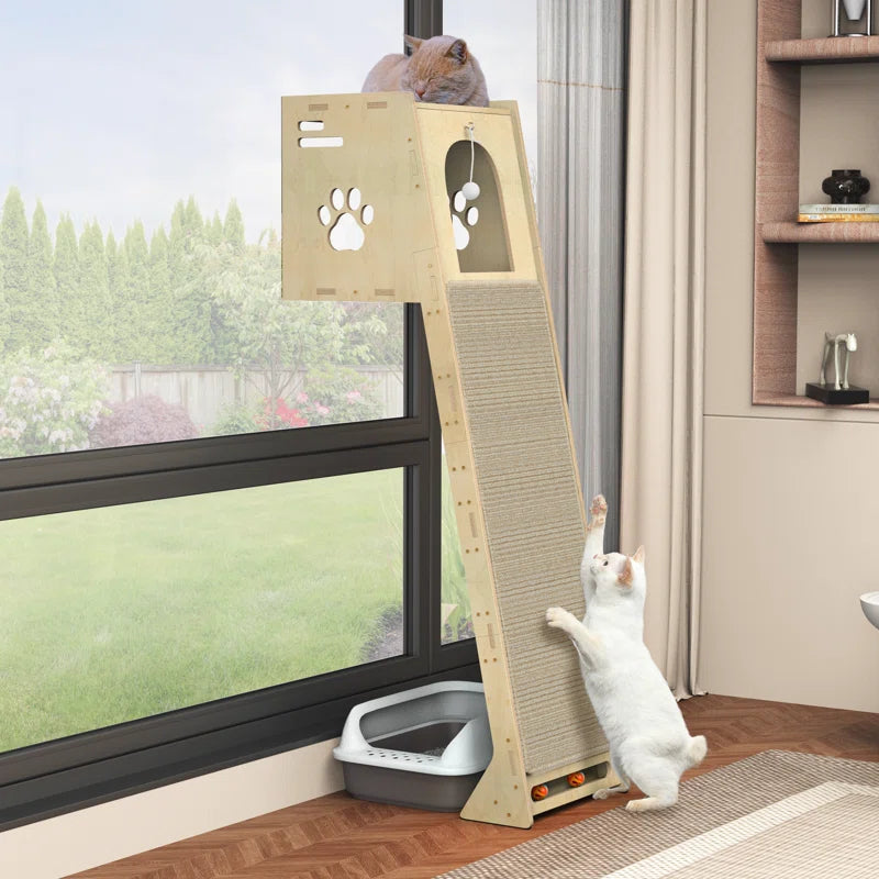 White cat perched inside top cubby of a light wood scratching ramp tower