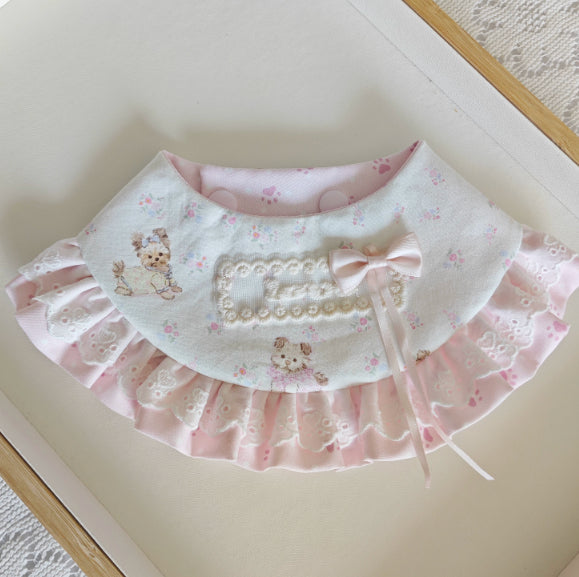 Pink lace-trimmed scarf with bow detail and teddy bear print border ruffle