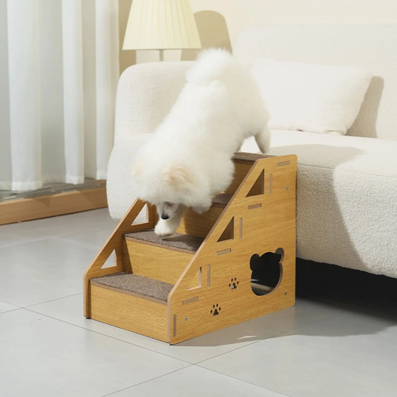 Wooden pet stairs with gray carpet treads and paw-print cutouts