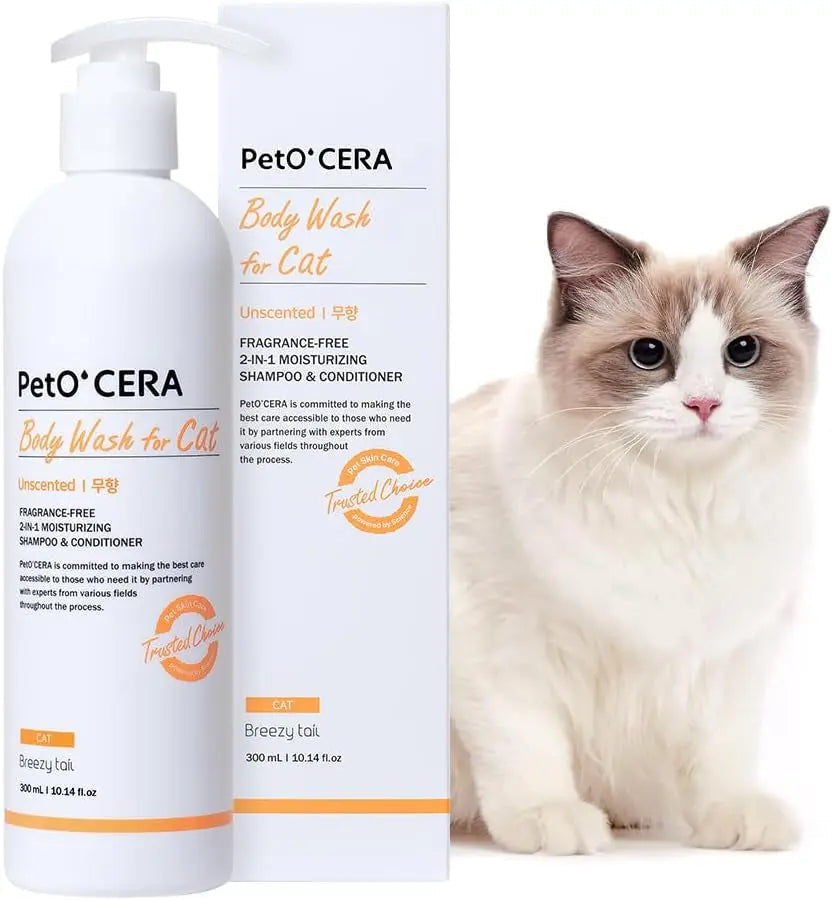 Unscented cat body wash bottle with pump and matching box beside cat
