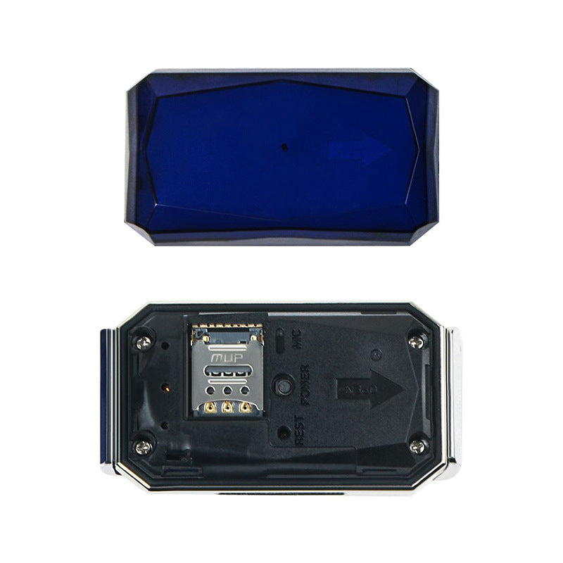 Back view of black GPS tracker module showing internal port panel