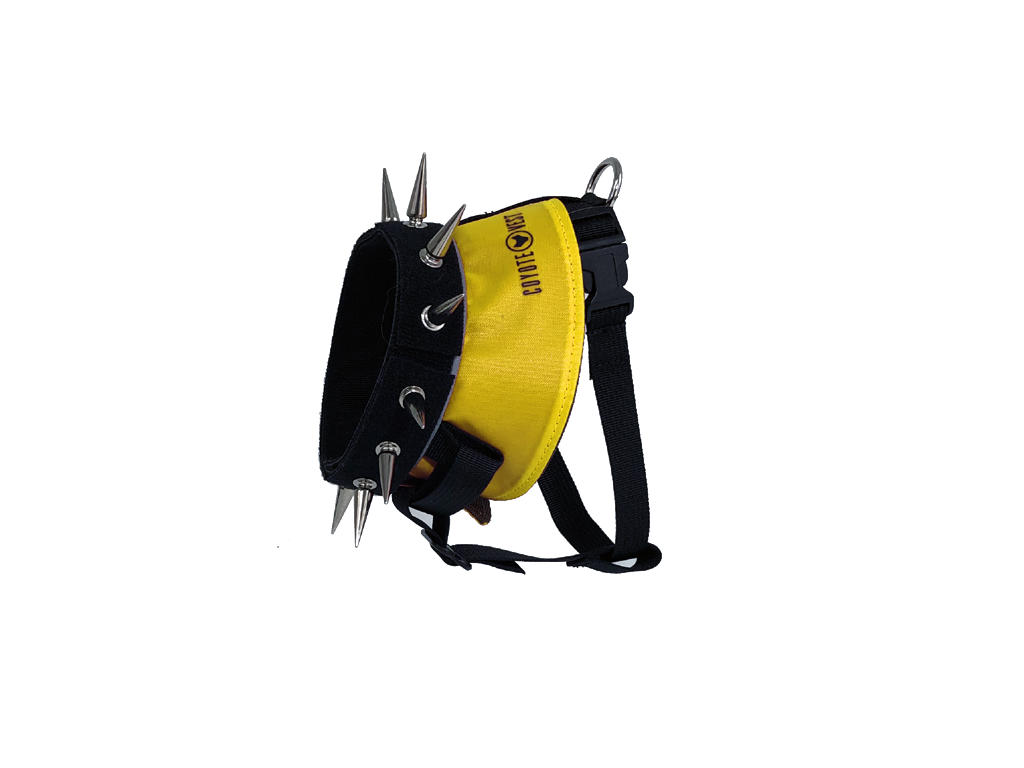 Spiked dog harness with yellow panel, black straps, metal studs and spikes