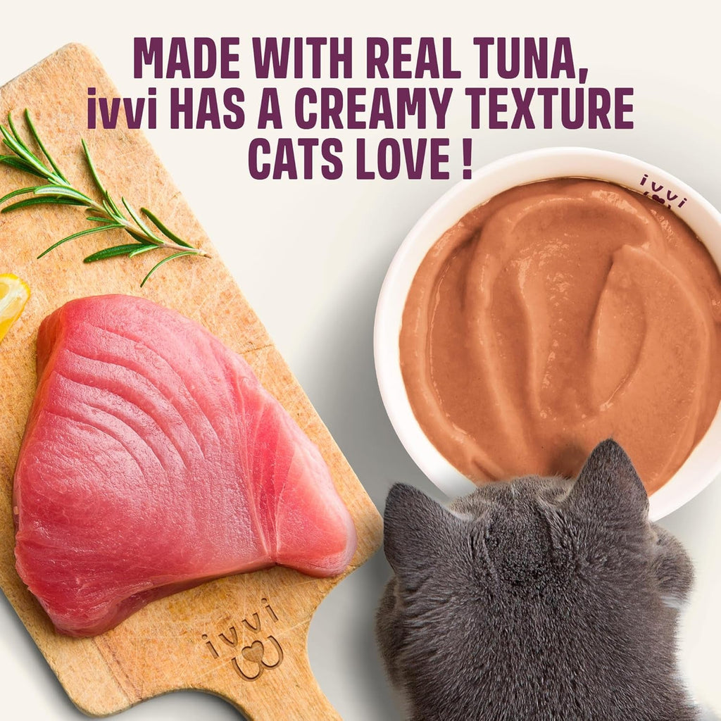 Cream tuna lickable treat in bowl with tuna steak on wooden board