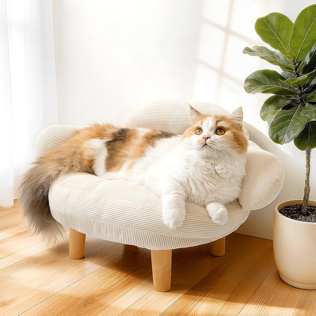 White round cat sofa bed with plush cushion and wooden legs, small pets lounging