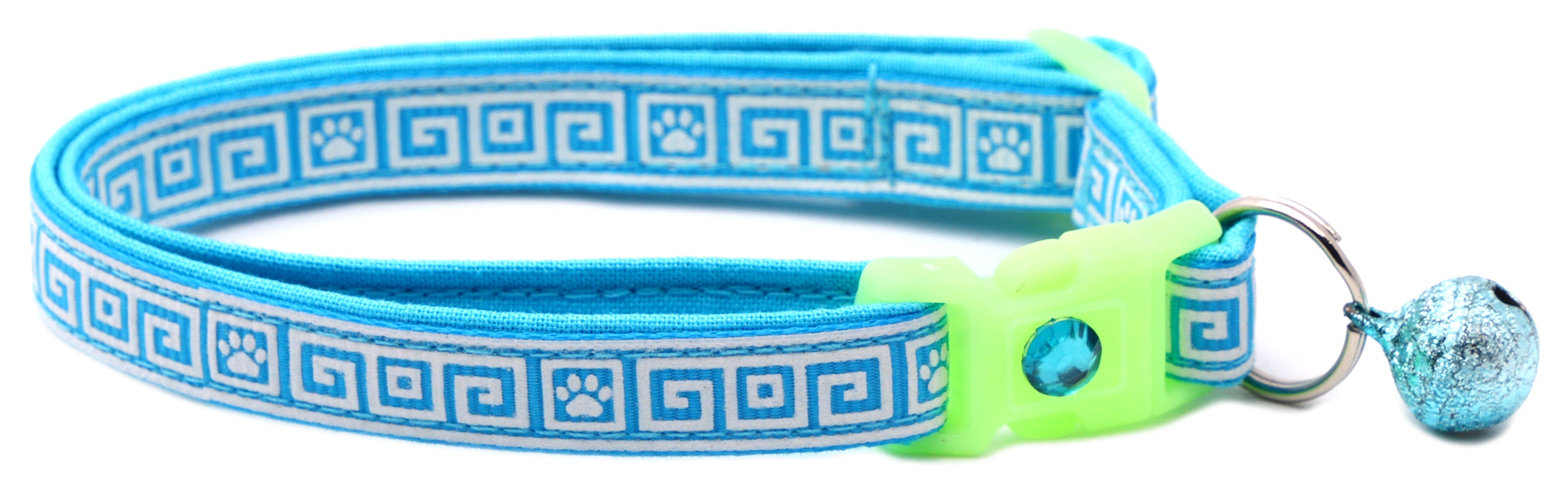 Breakaway cat collar with light blue Greek key pattern, light green buckle, metal ring clasp, no bell.