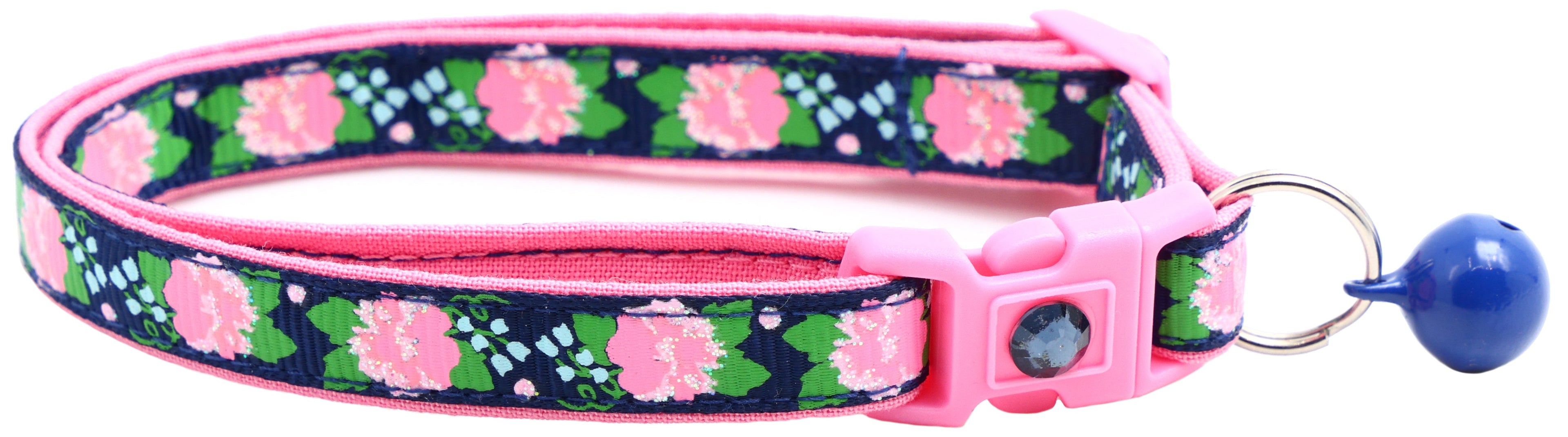 Navy floral cat collar with pink trim, pink buckle and dark gem, metal ring, blue bell