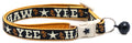 Breakaway collar in dark navy with orange trim, star pattern, silver clasp and black bell