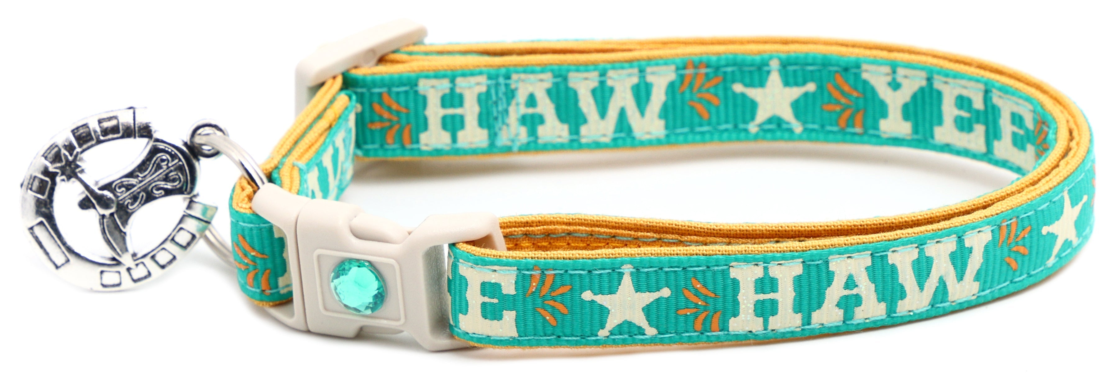 Aqua breakaway pet collar with orange trim, white buckle, “HAW” star print