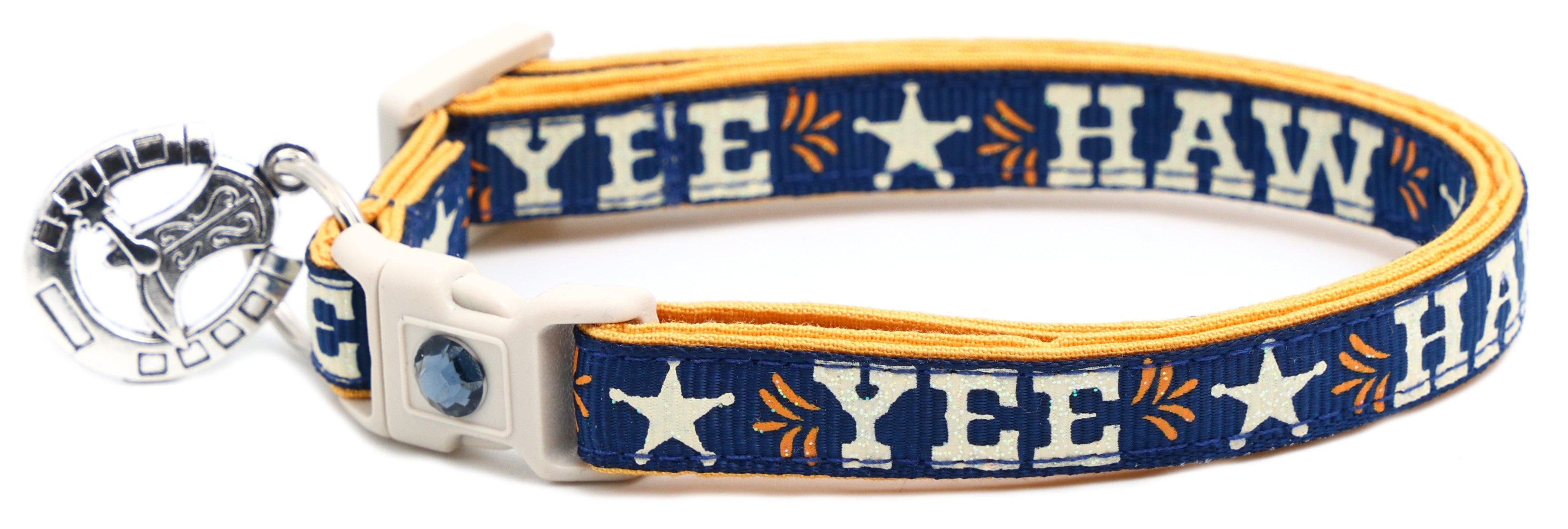Blue star-print breakaway dog collar with white buckle and metal charm