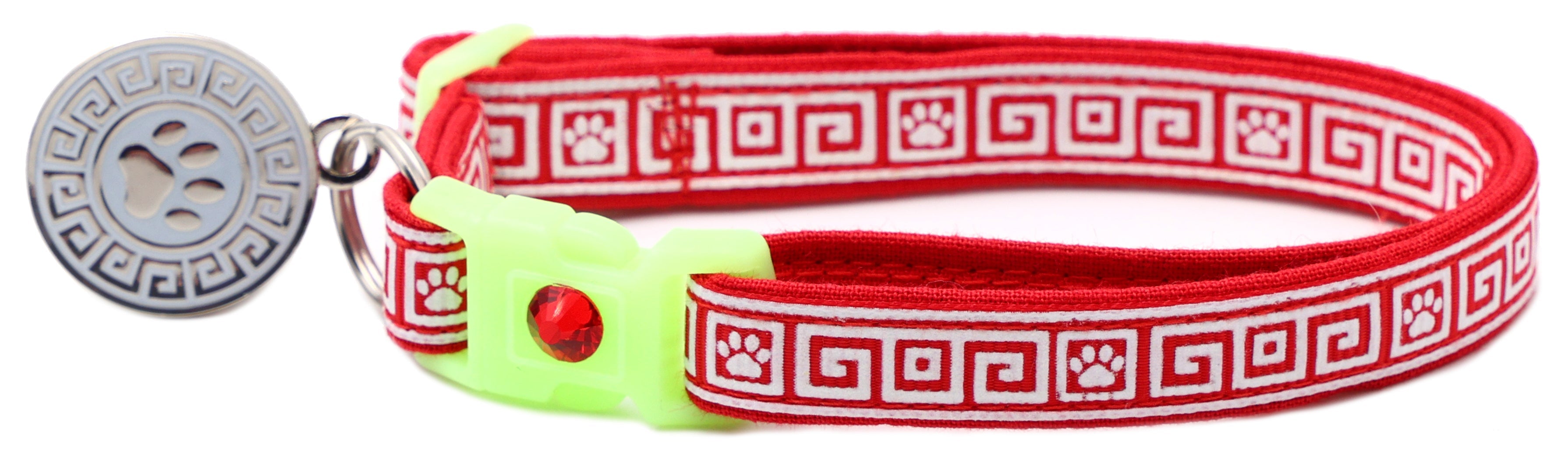 Greek Key breakaway cat collar in red with neon green buckle, red charm, and bell