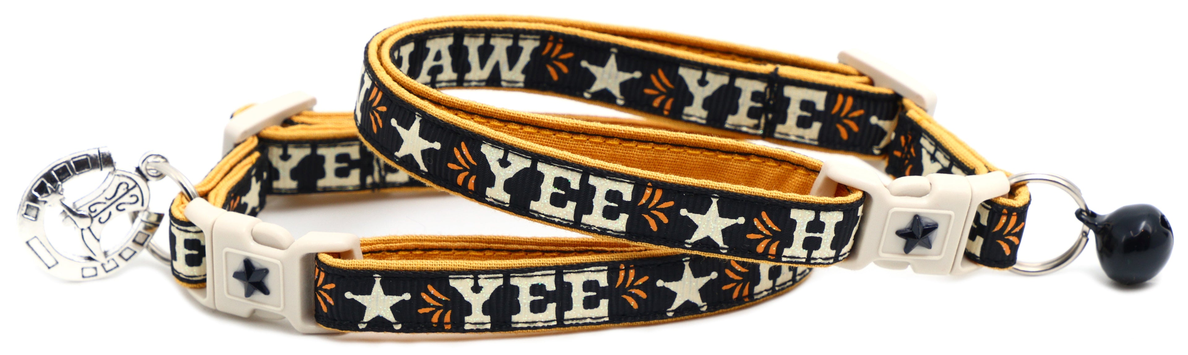 Navy breakaway pet collar with orange trim, white buckle, horseshoe charm and bell