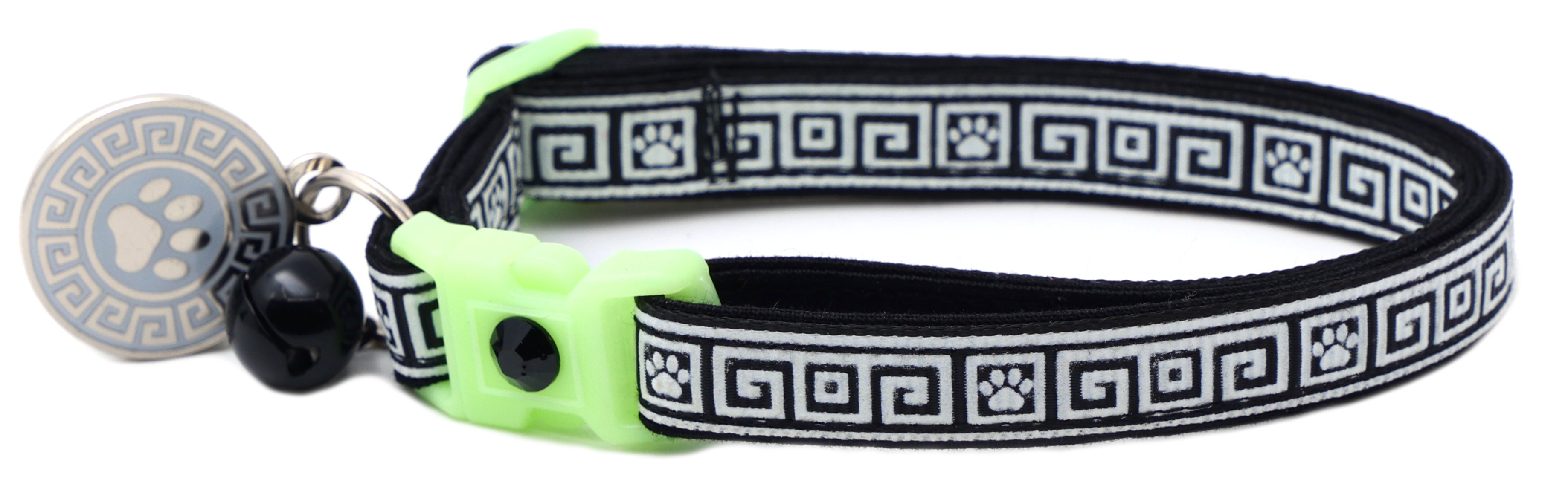 Black patterned cat collar with lime breakaway insert and black bell with silver paw tag