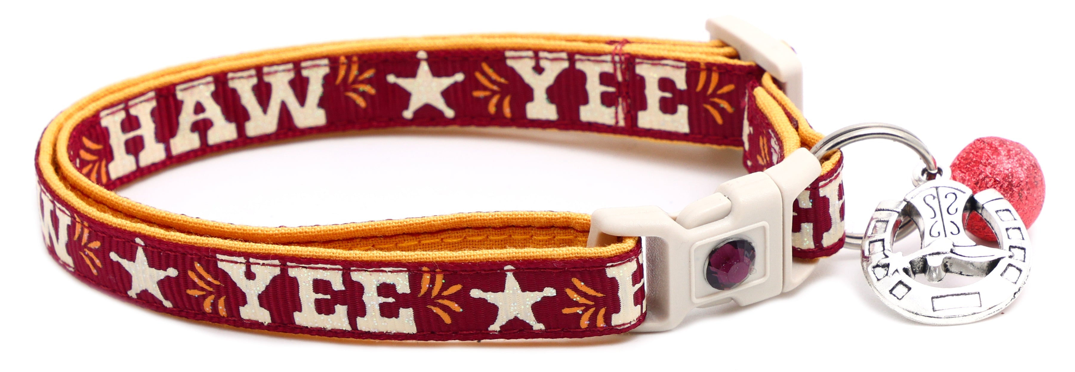 Breakaway dog collar, burgundy with “YEE HAW” embroidery, white buckle, and pink bell