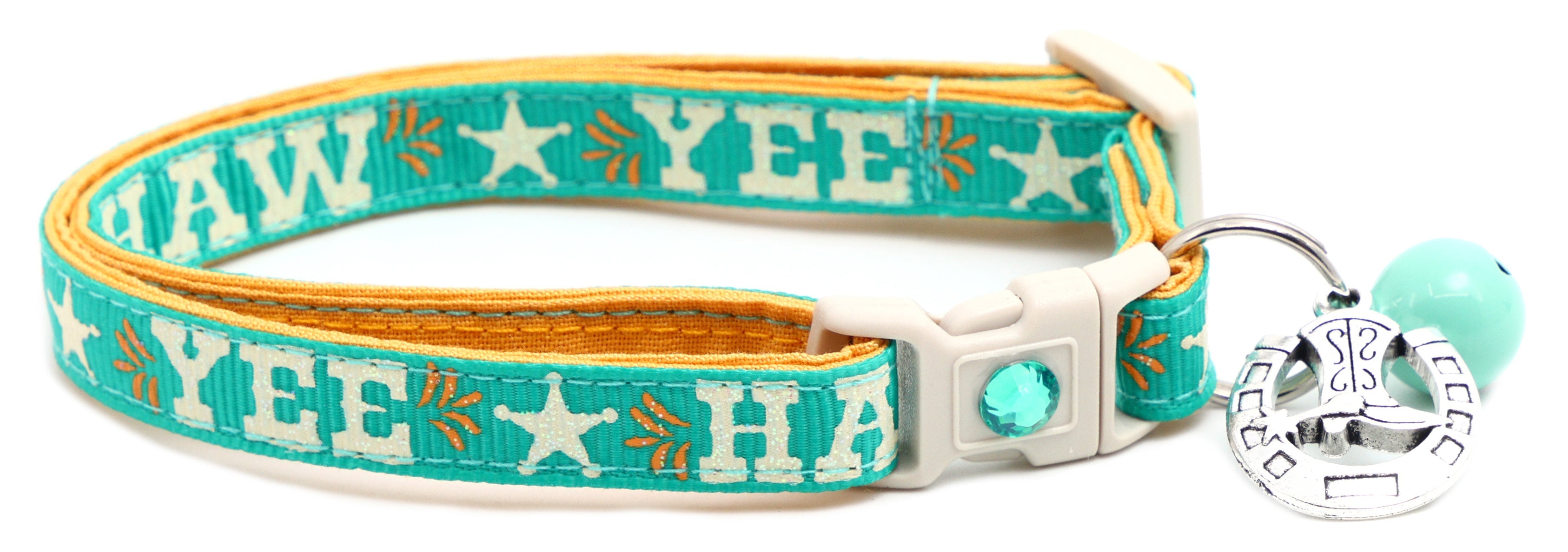 Breakaway dog collar with “YEE HAW” print, aqua and yellow trim, horseshoe charm