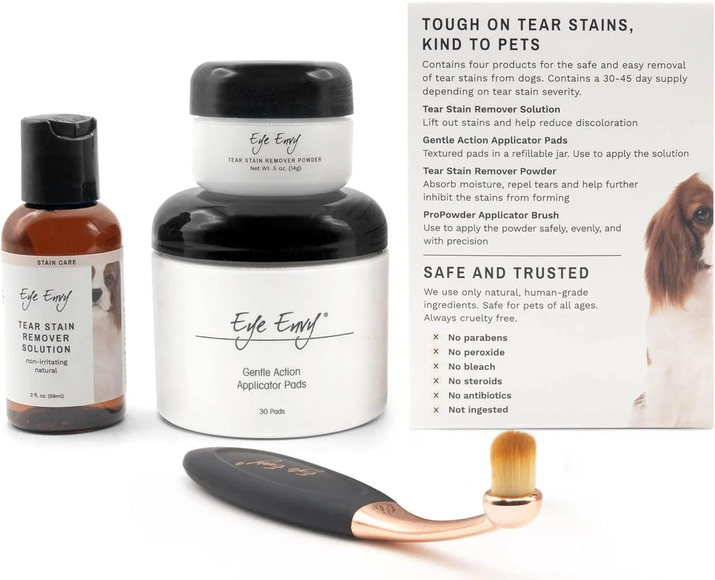 Tear stain remover kit showing powder jar, solution bottle, and applicator brush with pads