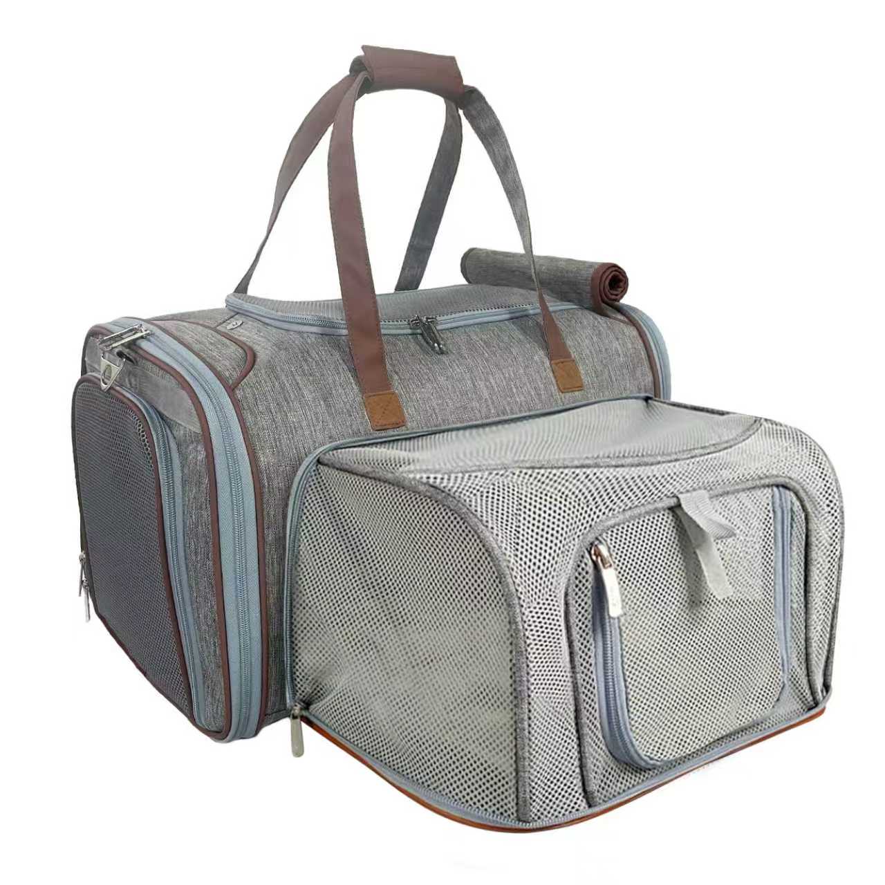 Expandable pet carrier with mesh front panels, top handle, and roll-up side cover; gray