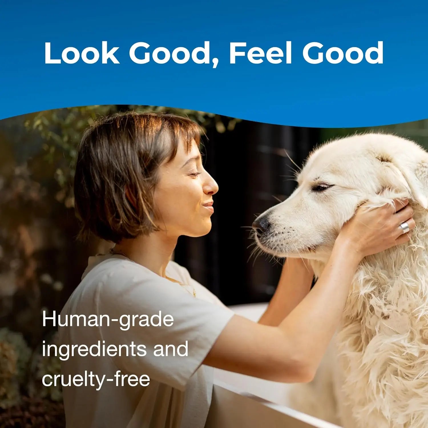 Dog shampoo and conditioner set, woman bathing a white dog
