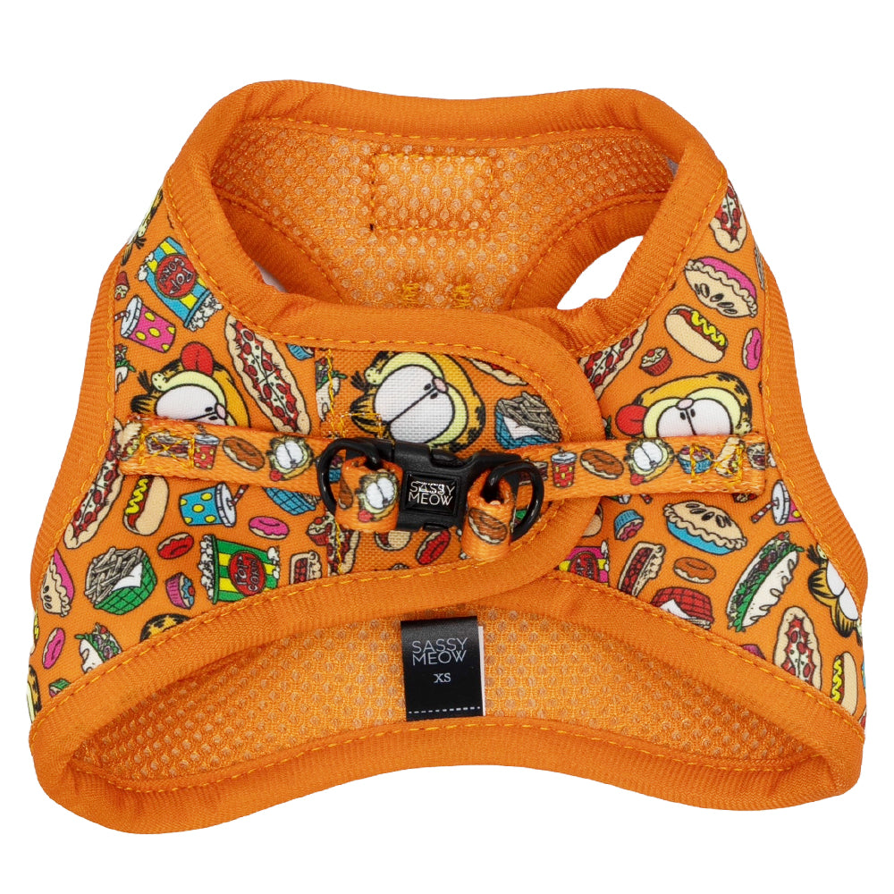Orange cat step-in harness with front strap, black plastic buckle, and Garfield™️ print