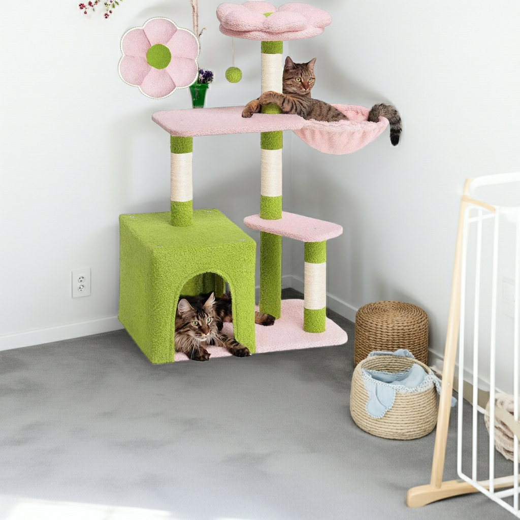 Green and pink cat tree with two-door condo, scratching posts, floral perch, and hammock