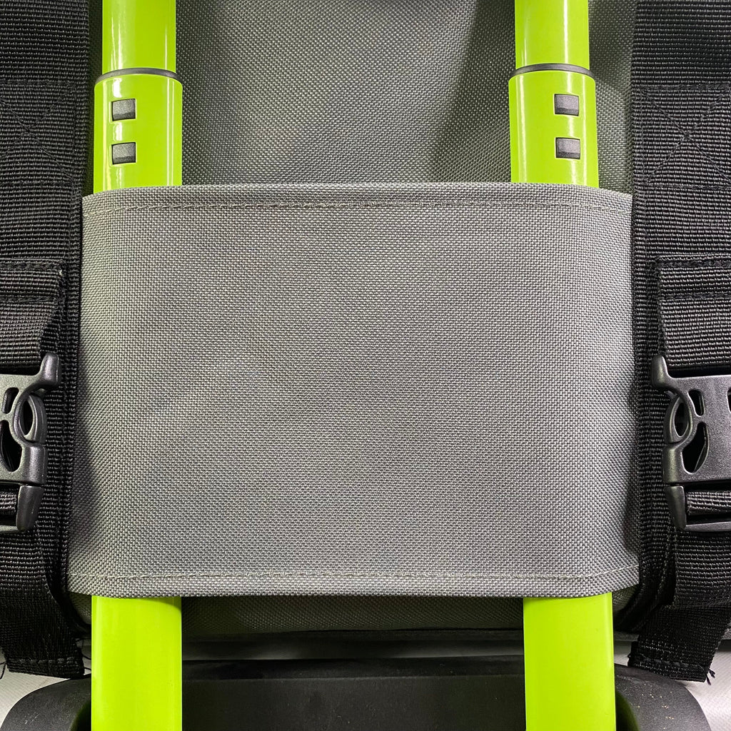 Padded gray interior floor with mesh sides inside soft-sided pet carrier