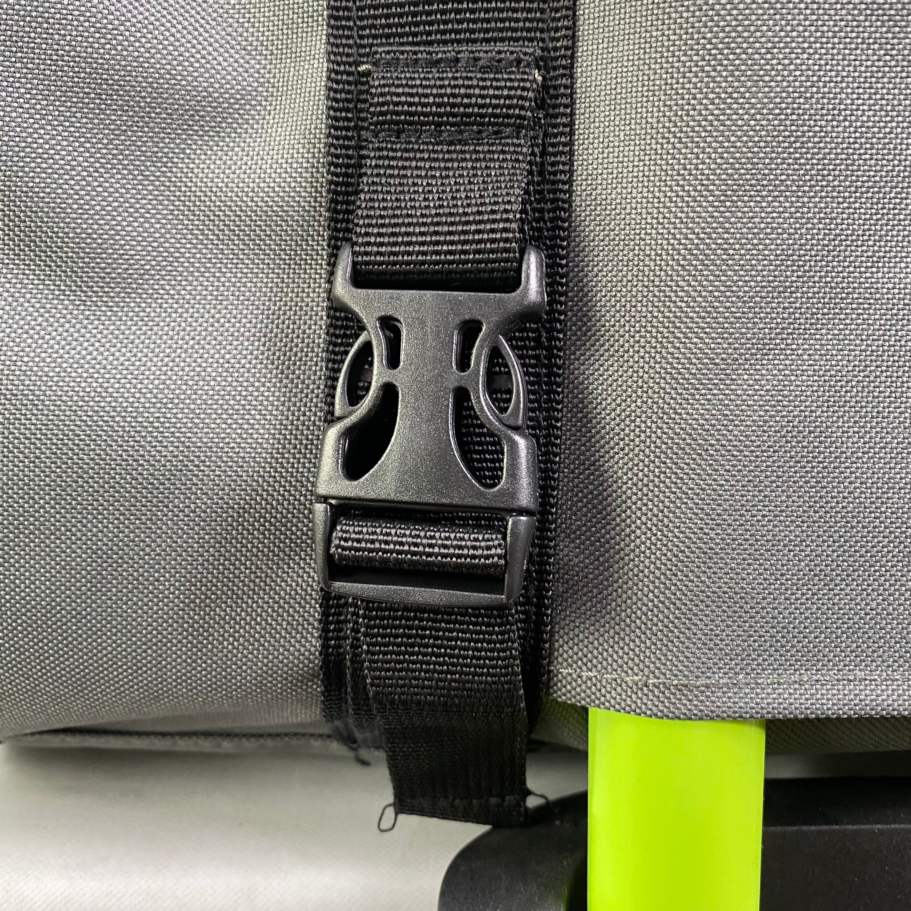 Close-up of strap attachment on charcoal ash soft-sided pet carrier