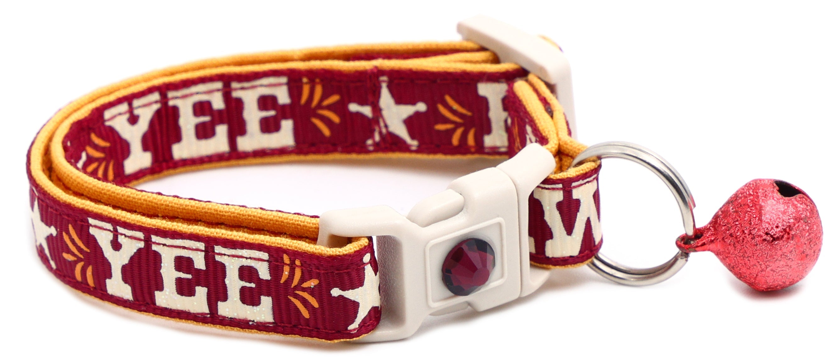 Breakaway dog collar, burgundy with “YEE HAW” embroidery, white buckle, and pink bell