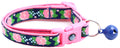 Navy floral cat collar with pink buckle, metal ring, blue jingle bell attached