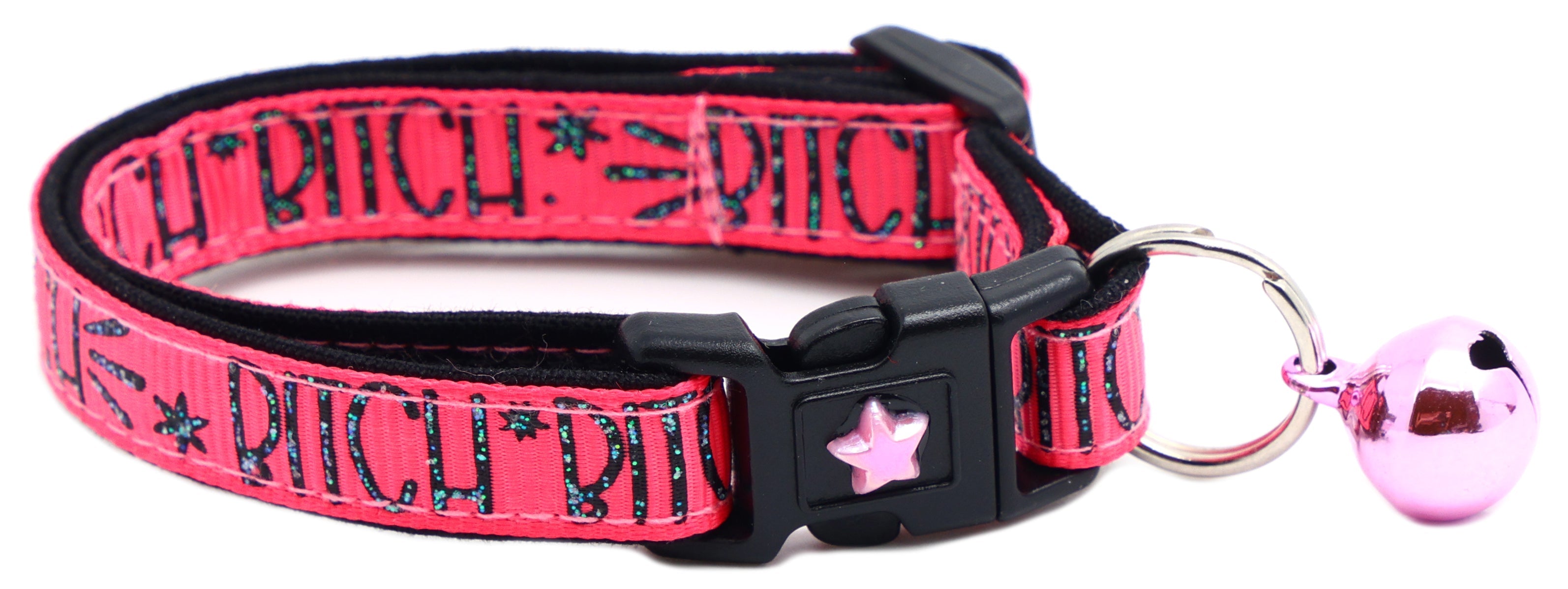 Pink fabric cat collar with black buckle, star emblem and pink bell