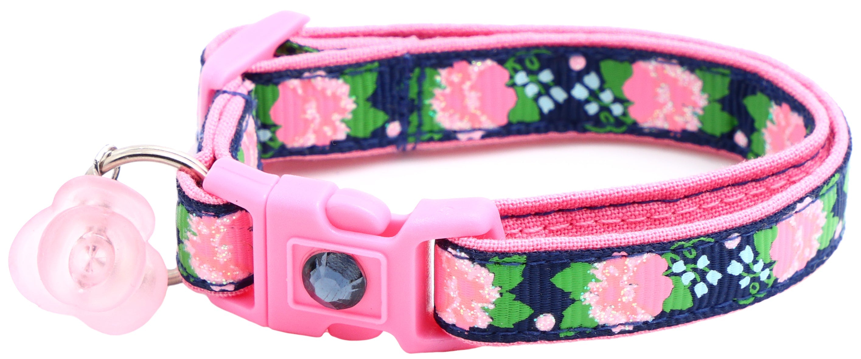 Navy floral cat collar with pink buckle and dark gem, large pink bell charm, D-ring