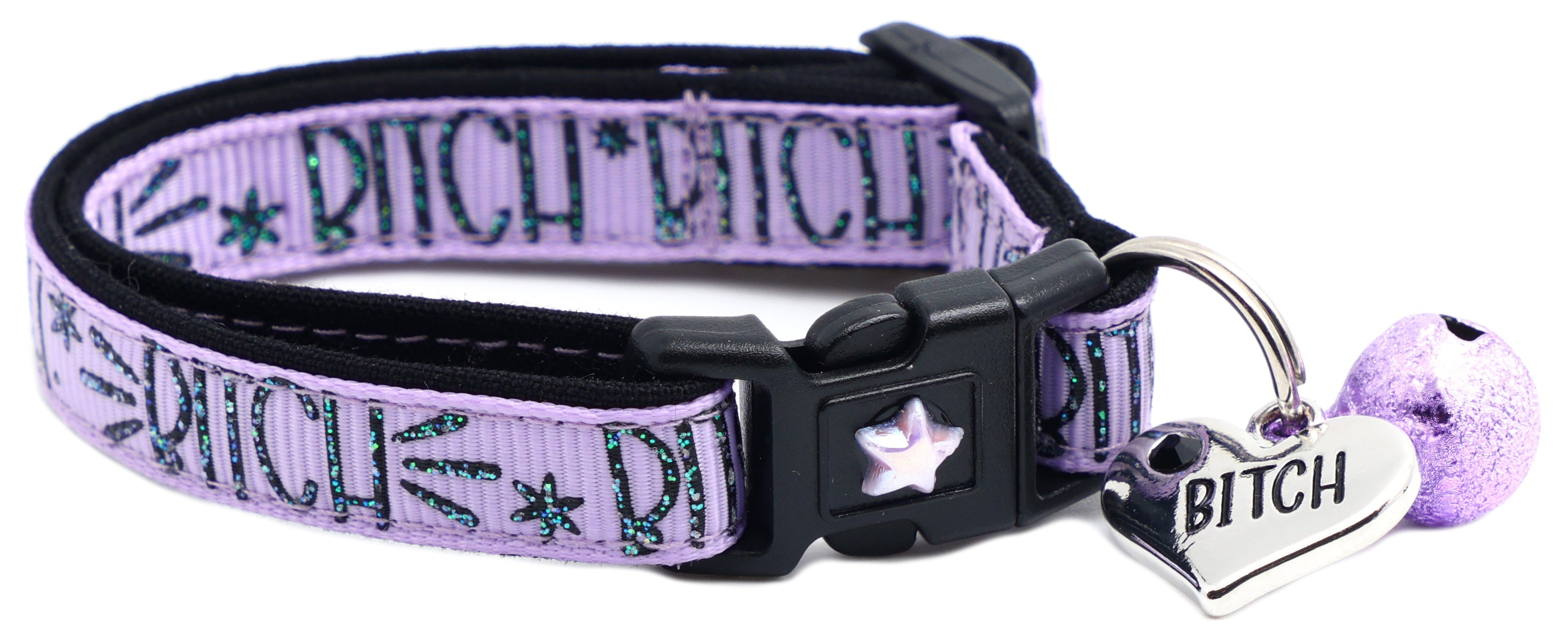Purple breakaway cat collar with black buckle, star charm, heart tag and purple bell.