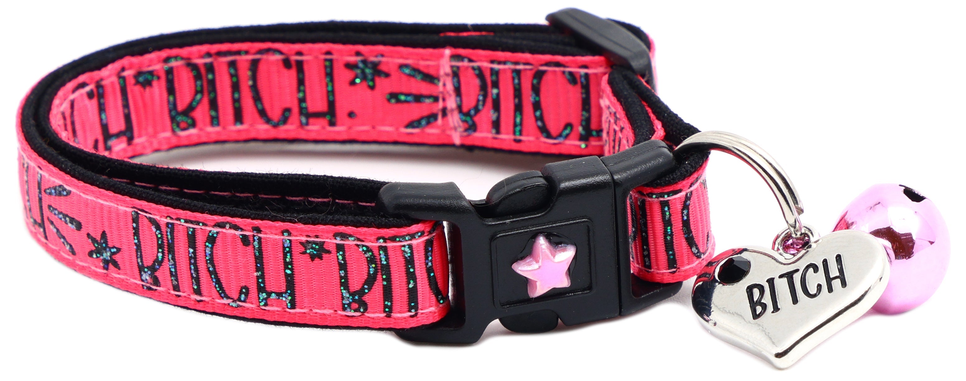 Pink breakaway cat collar with black buckle, star charm and heart tag with pink bell.