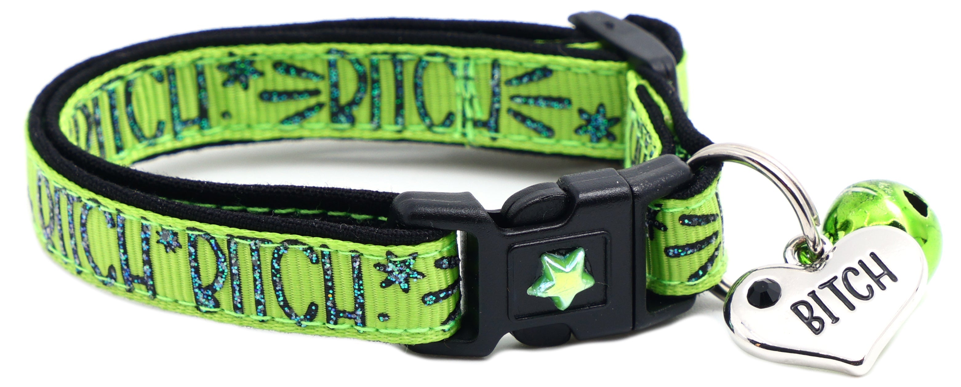 Green fabric cat collar with black buckle, star emblem, BITCH heart tag and green bell