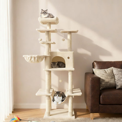 Beige cat tree tower with condo, hammock bed, and sisal scratching posts for indoor cats