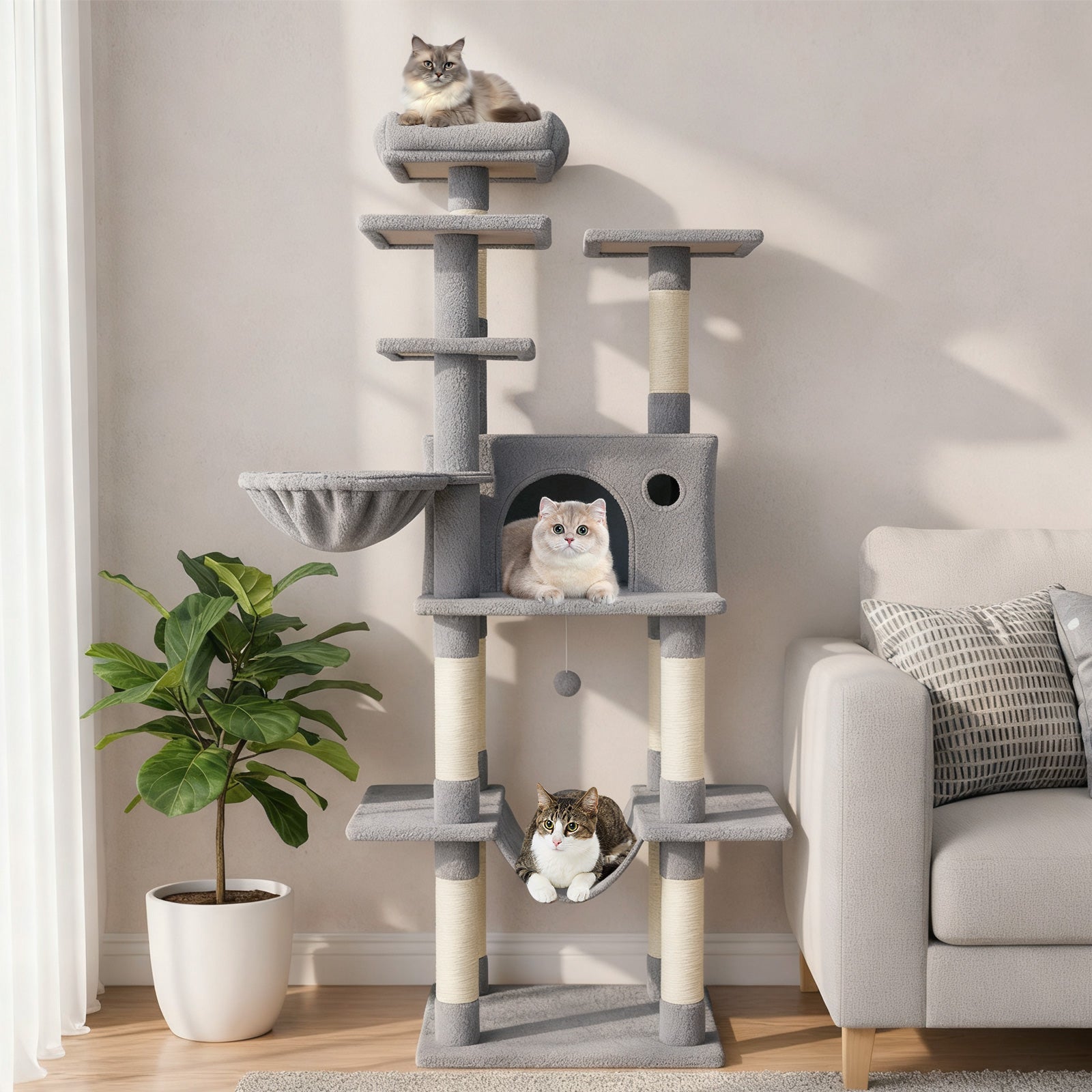 Gray cat tree with gray platforms, enclosed cubby, and dangling hammock