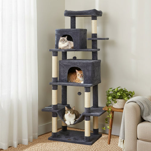 Dark gray cat tree with enclosed condos, side perches, and hanging ball