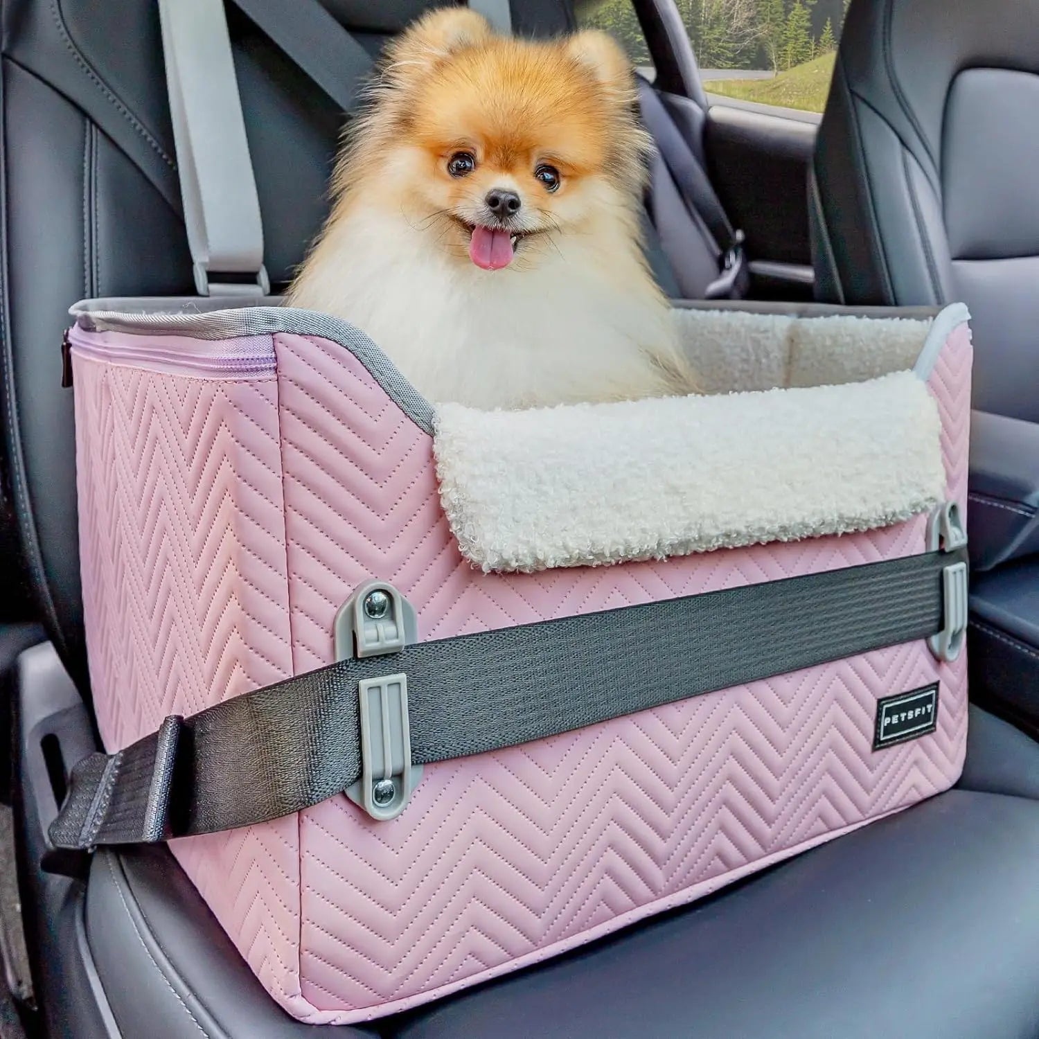 Pink foldable pet booster car seat with safety buckles and tether strap, plush lining