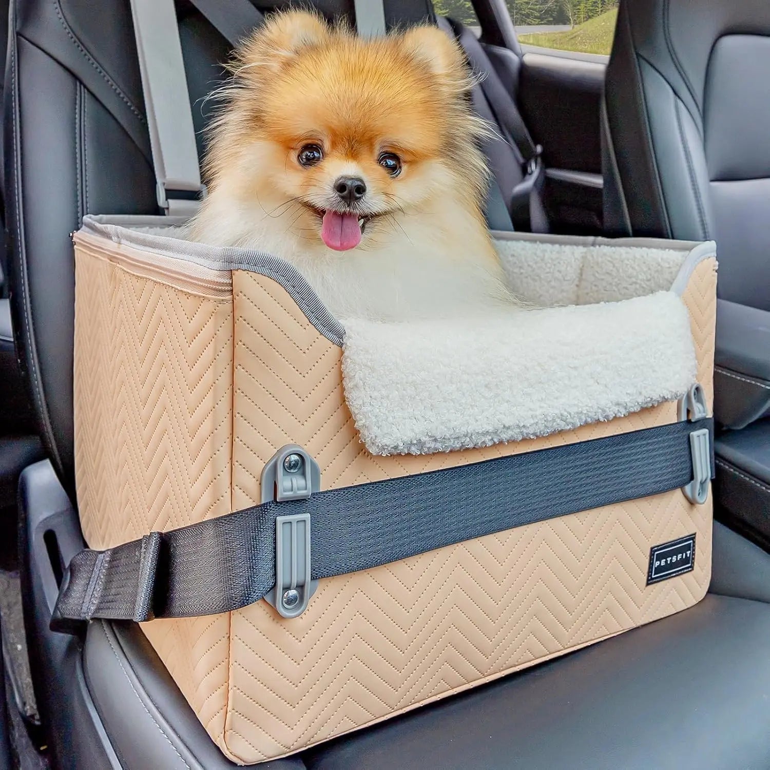 Beige foldable pet booster car seat with safety buckles and tether strap, plush lining